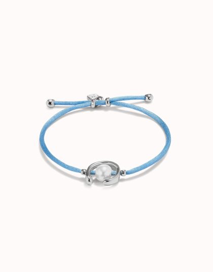 Pulsera de hilo azul con perla shell fornitura bañada en plata de ley.