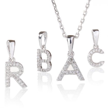 "PETRICOR" colgante letra Diamante Oro 18K